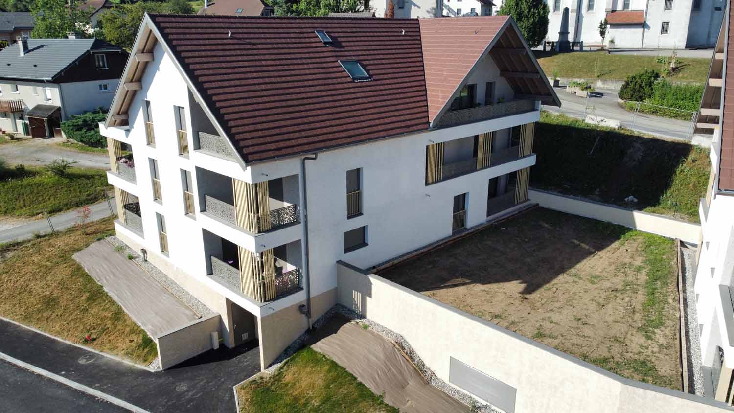 Création d'un quartier avec 3 bâtiments et 17 villas mitoyennes en Haute-Savoie